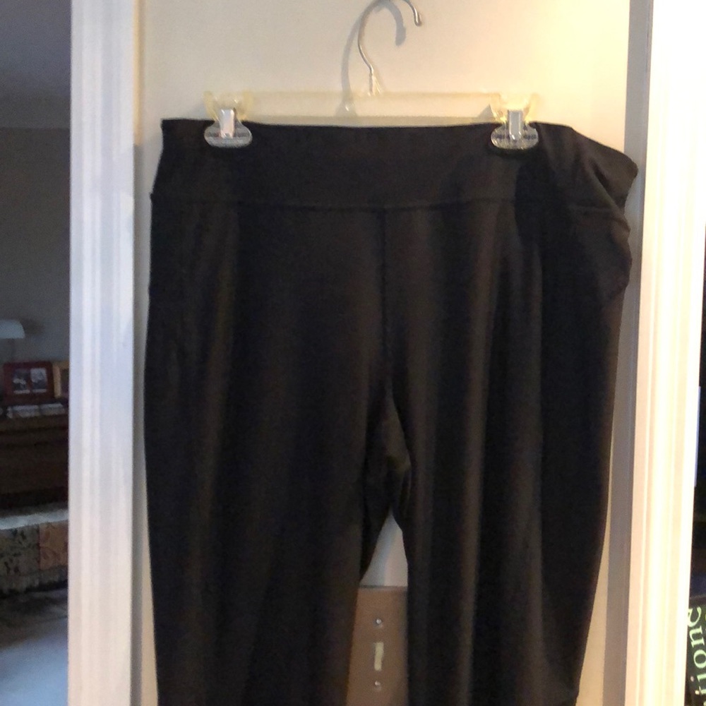 Black workout/yoga pants. They are long.